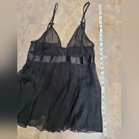 Satiny Lingerie with adjustable features. - Picture 3 of 7